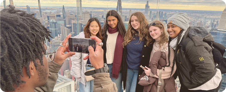 Boy taking group picture